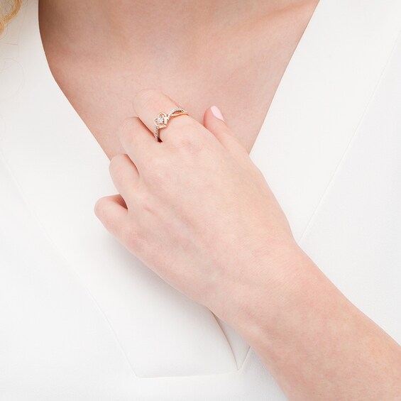 Previously Owned - Cherished Promise Collectionâ¢ 1/8 CT. T.w. Diamond Heart Frame Promise Ring in 10K Two-Tone Gold