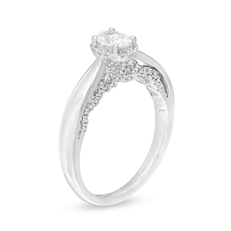 Main Image 3 of Previously Owned - Celebration Ideal 3/4 CT. T.W. Oval Diamond Frame Engagement Ring in 14K White Gold (I/I1)