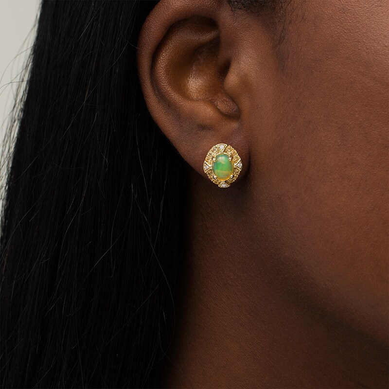 Main Image 2 of Previously Owned - Captivating Color Oval Opal, Spessartite and 1/20 CT. T.W. Diamond Frame Stud Earrings in 14K Gold