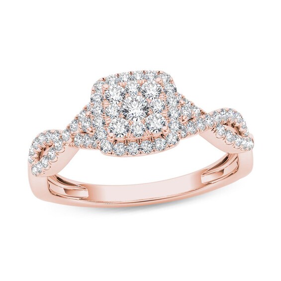 Previously Owned - 1/2 CT. T.w. Diamond Cushion Frame Twist Shank Engagement Ring in 14K Rose Gold