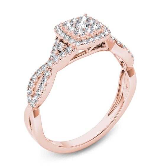 Previously Owned - 1/2 CT. T.w. Diamond Cushion Frame Twist Shank Engagement Ring in 14K Rose Gold