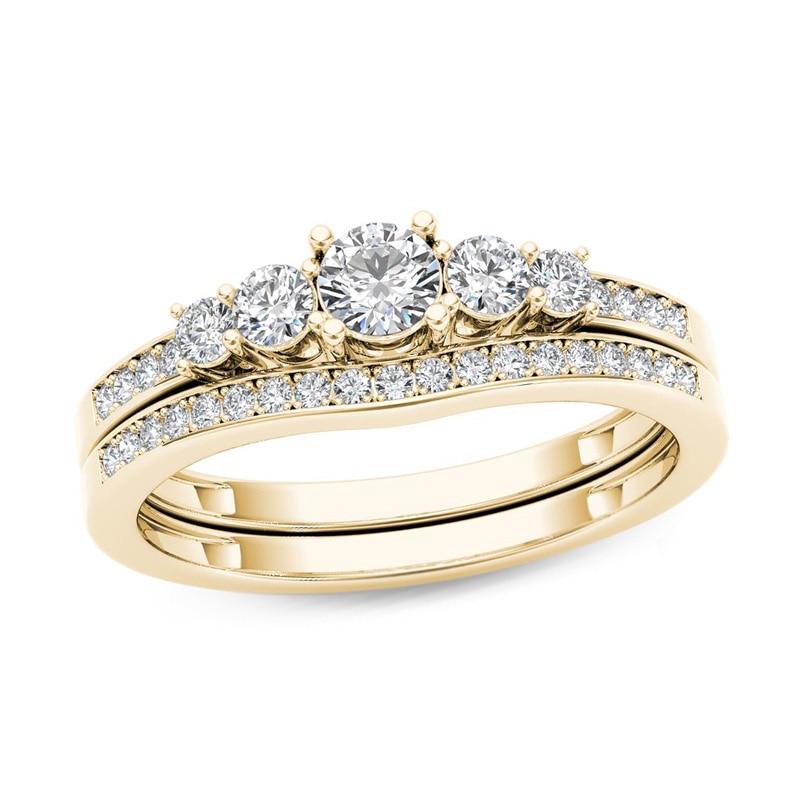 Main Image 1 of Previously Owned - 1/2 CT. T.W. Diamond Five Stone Bridal Set in 14K Gold