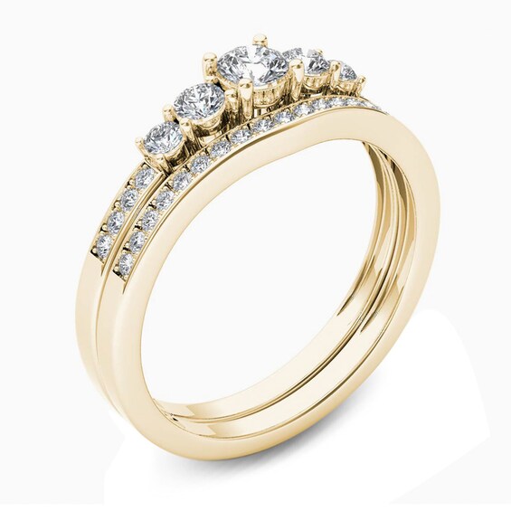 Previously Owned - 1/2 CT. T.w. Diamond Five Stone Bridal Set in 14K Gold