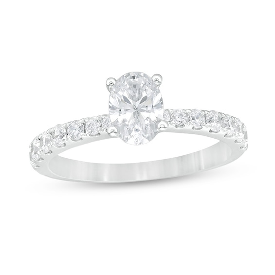 Previously Owned - 1 CT. T.w. Oval Diamond Engagement Ring in 14K White Gold (I/Si2)