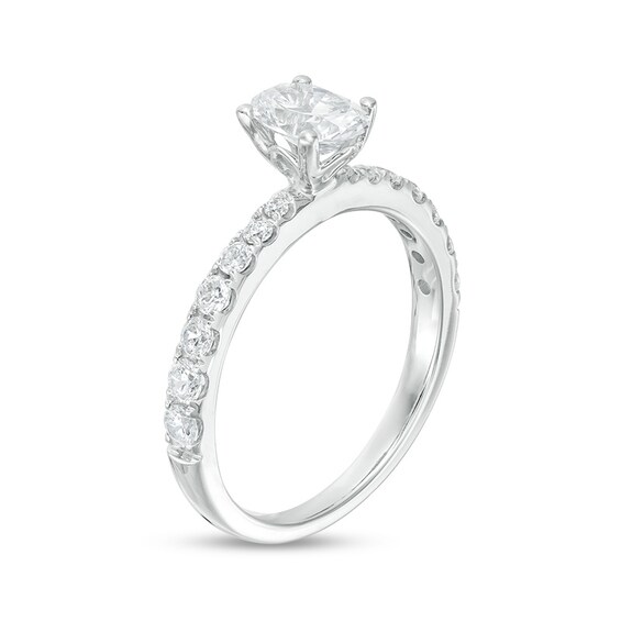 Previously Owned - 1 CT. T.w. Oval Diamond Engagement Ring in 14K White Gold (I/Si2)