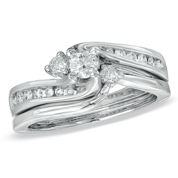 Previously Owned - 1/2 CT. T.W. Diamond Three Stone Swirl Bridal Set in 14K White Gold