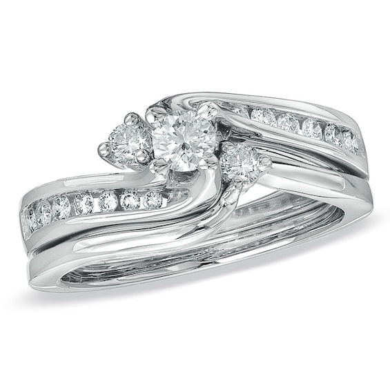 Previously Owned - 1/2 CT. T.w. Diamond Three Stone Swirl Bridal Set in 14K White Gold