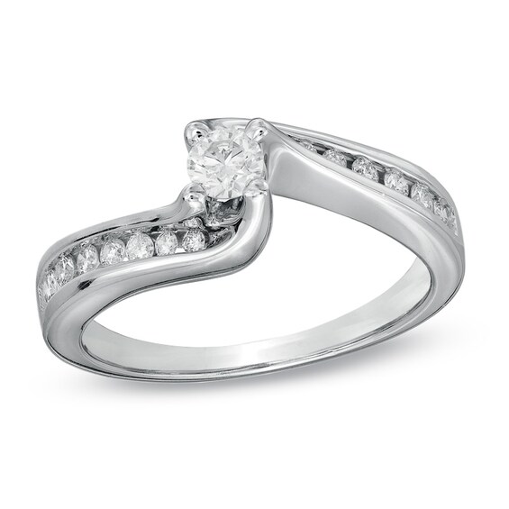 Previously Owned - 1/2 CT. T.w. Diamond Three Stone Swirl Bridal Set in 14K White Gold