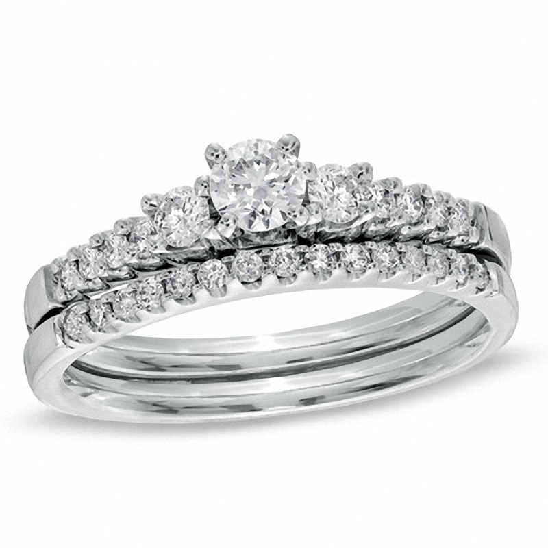 Main Image 1 of Previously Owned - 5/8 CT. T.W. Diamond Three Stone Bridal Set in 14K White Gold