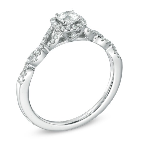 Previously Owned - Celebration Fireâ¢ 1/2 CT. T.w. Diamond Frame Twist Engagement Ring in 14K White Gold (H-I/Si1-Si2)