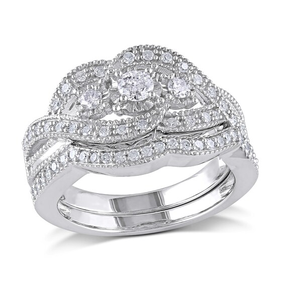 Previously Owned - 1/2 CT. T.w. Diamond Three Stone Knot Bridal Set in Sterling Silver