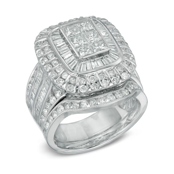 Previously Owned - 3 CT. T.w. Emerald-Shaped Multi-Diamond Layered Frame Bridal Set in 10K White Gold