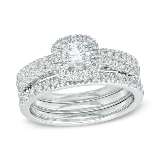 Previously Owned - 1 CT. T.w. Diamond Frame Three Piece Bridal Set in 14K White Gold