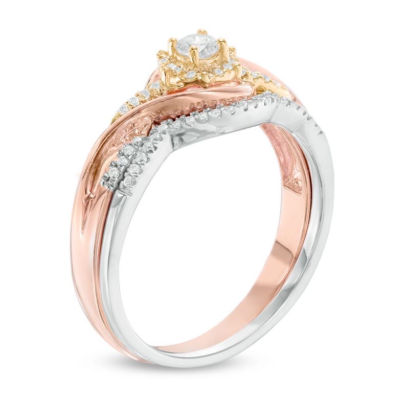 Main Image 2 of Previously Owned - 1/4 CT. T.W. Diamond Frame Swirl Bridal Set in 10K Tri-Tone Gold