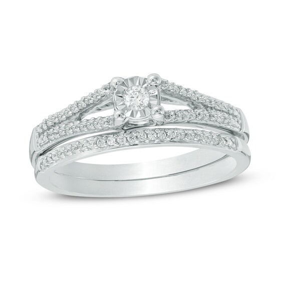 Previously Owned - 1/5 CT. T.w. Diamond Split Shank Bridal Set in 10K White Gold