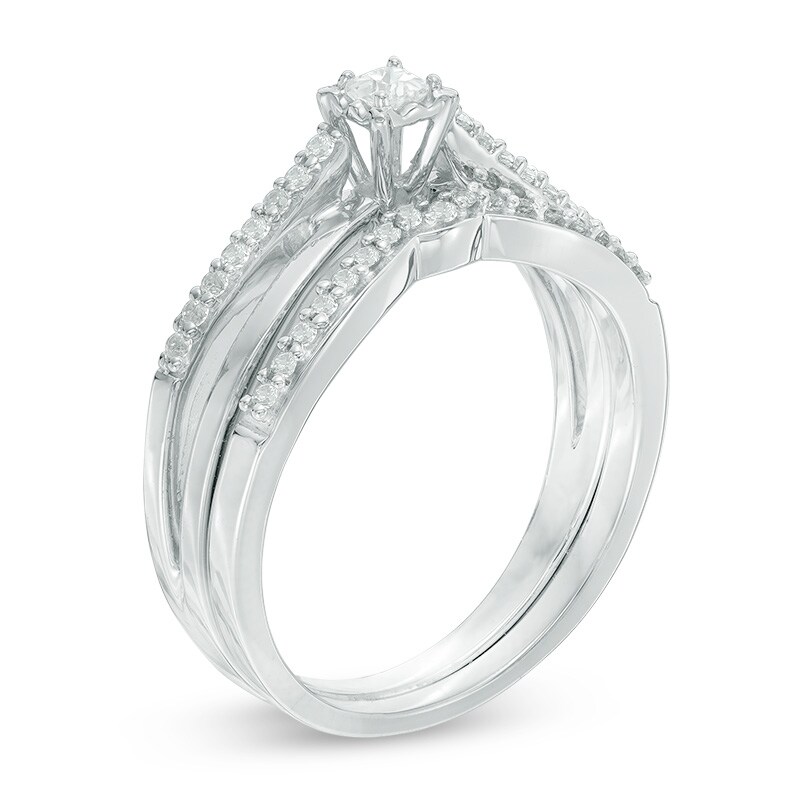 Main Image 2 of Previously Owned - 1/4 CT. T.W. Princess-Cut Diamond Crossover Bridal Set in 10K White Gold