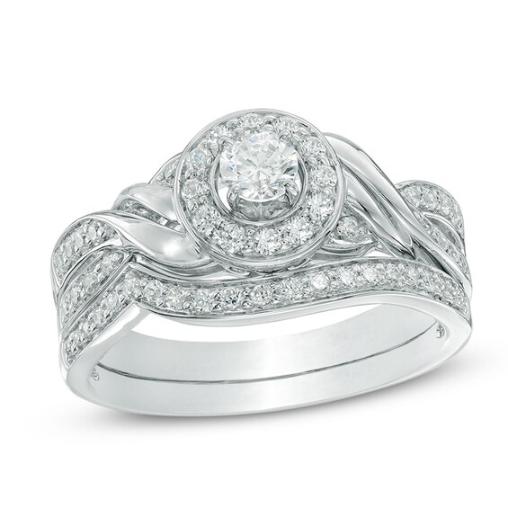 Previously Owned - 5/8 CT. T.w. Diamond Frame Twist Bridal Set in 10K White Gold
