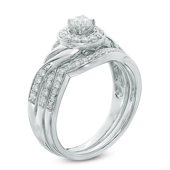 Previously Owned - 5/8 CT. T.w. Diamond Frame Twist Bridal Set in 10K White Gold