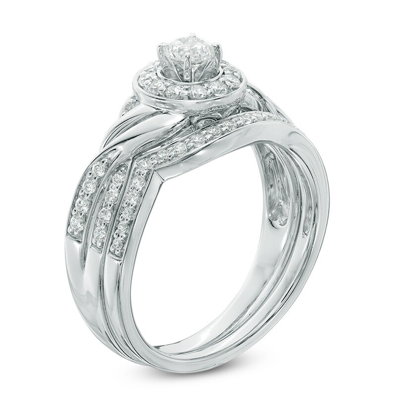 Main Image 2 of Previously Owned - 5/8 CT. T.W. Diamond Frame Twist Bridal Set in 10K White Gold