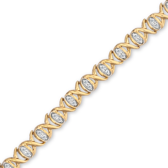 Previously Owned - 1/2 CT. T.w. Diamond "X" and "O" Bracelet in 10K Gold