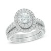 Thumbnail Image 1 of Previously Owned - 2 CT. T.W. Diamond Oval Frame Bridal Set in 14K White Gold