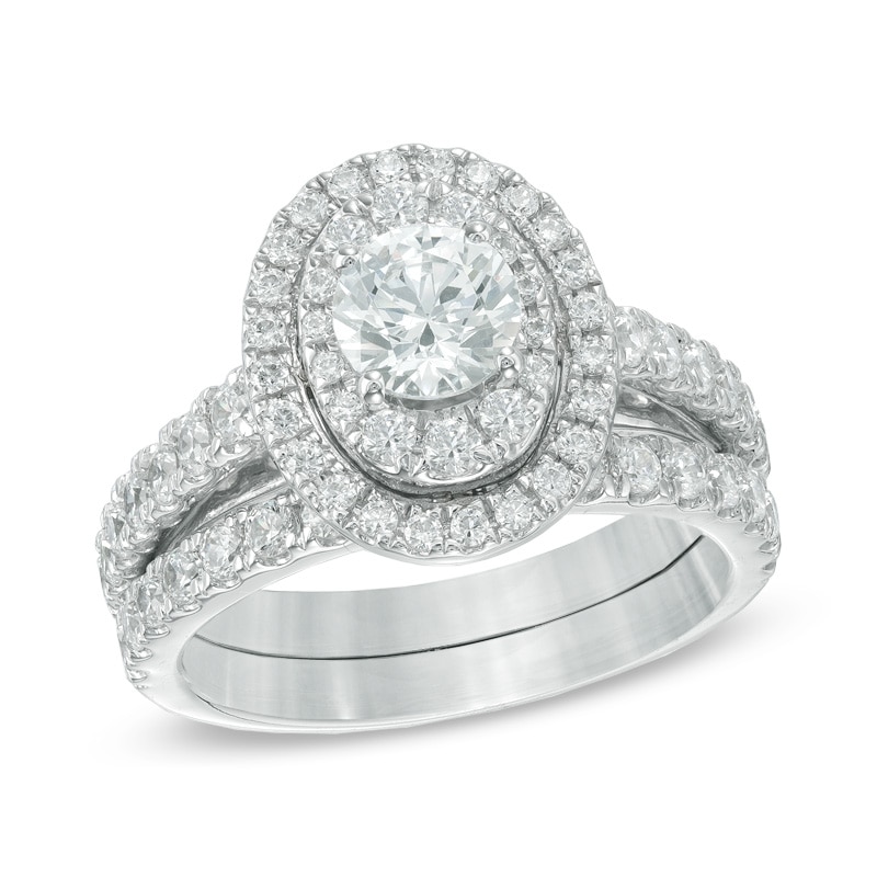 Main Image 1 of Previously Owned - 2 CT. T.W. Diamond Oval Frame Bridal Set in 14K White Gold