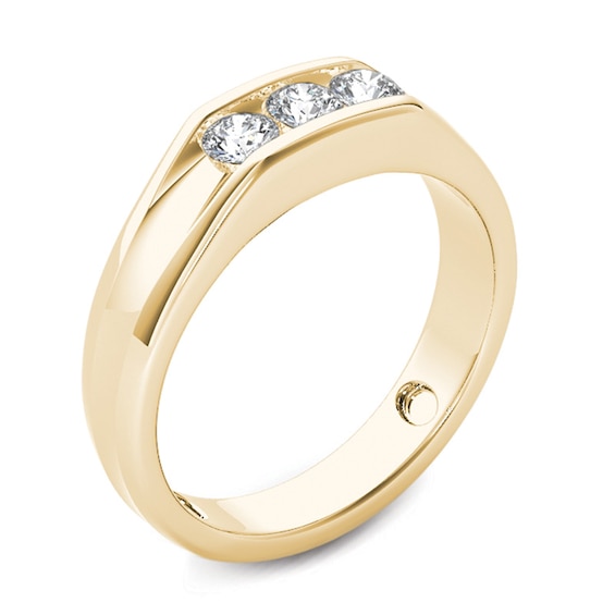 Previously Owned - 1/2 CT. T.w. Diamond Three Stone Wedding Band in 14K Gold