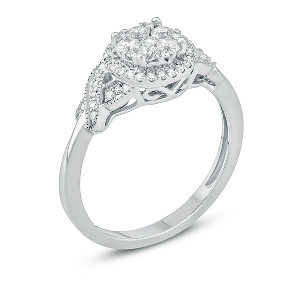 Previously Owned - 1/2 CT. T.w. Composite Diamond Frame Twist Engagement Ring in 10K White Gold