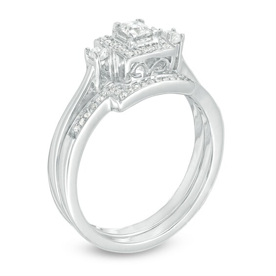 Previously Owned - 1/3 CT. T.w. Princess-Cut Diamond Three Stone Frame Bridal Set in 10K White Gold