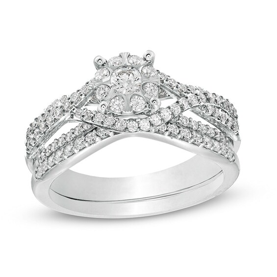 Previously Owned - 3/4 CT. T.w. Composite Diamond Twist Shank Bridal Set in 10K White Gold