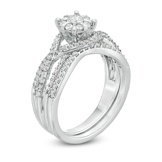 Previously Owned - 3/4 CT. T.w. Composite Diamond Twist Shank Bridal Set in 10K White Gold