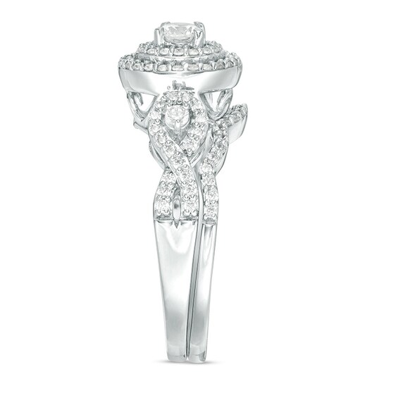 Previously Owned - 3/4 CT. T.w. Diamond Double Frame Twist Bridal Set in 10K White Gold