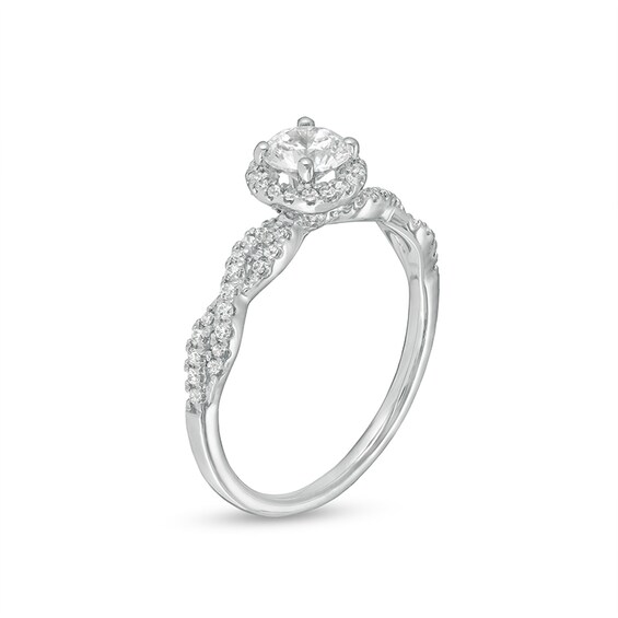 Previously Owned - 3/4 CT. T.w. Diamond Frame Twist Shank Engagement Ring in 14K White Gold