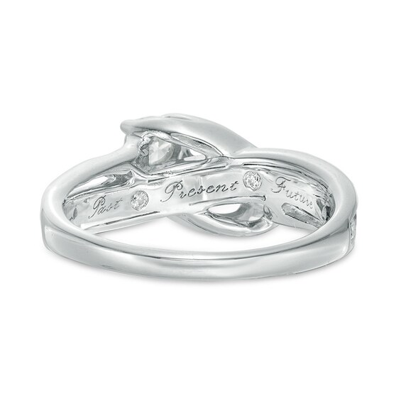 Previously Owned - 1 CT. T.w. Diamond Three Stone Slant Engagement Ring in 14K White Gold