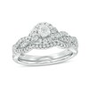 Thumbnail Image 1 of Previously Owned - 1/2 CT. T.W. Diamond Frame Twist Bridal Set in 10K White Gold