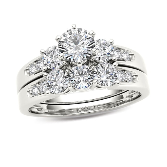 Previously Owned - 1-1/2 CT. T.w. Diamond Three Stone Bridal Set in 14K White Gold