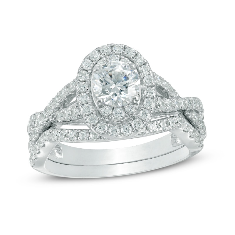 Main Image 1 of Previously Owned - 1-1/2 CT. T.W. Diamond Oval Frame Twist Bridal Set in 14K White Gold