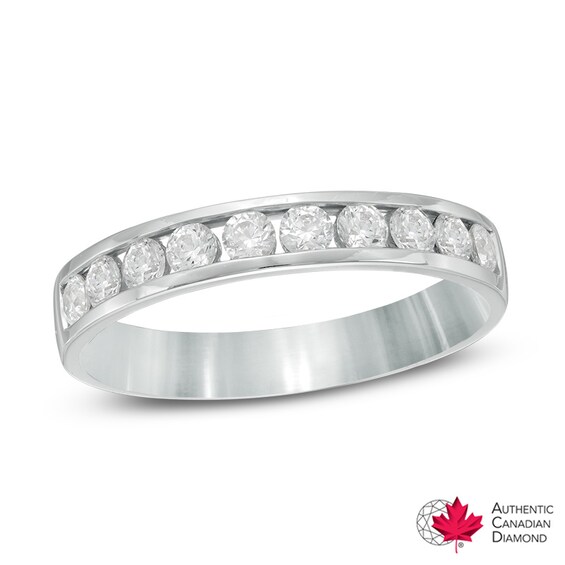 Previously Owned - 1/2 CT. T.w. Diamond Anniversary Band in 14K White Gold (I/I1)