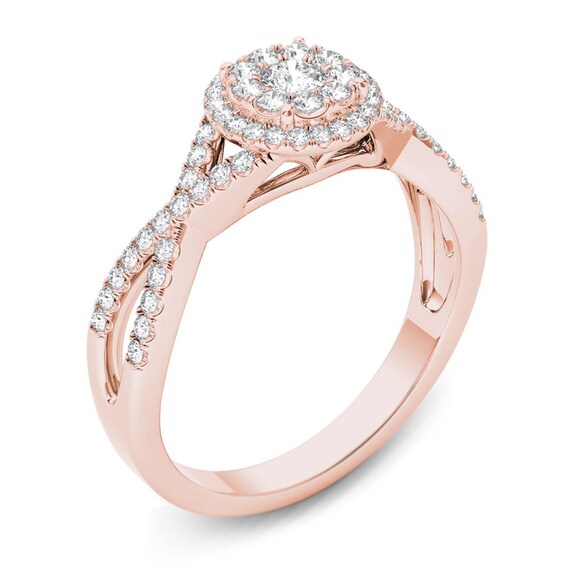 Previously Owned - 1/2 CT. T.w. Diamond Frame Twist Shank Engagement Ring in 14K Rose Gold