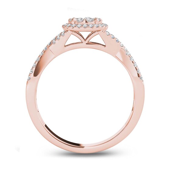 Previously Owned - 1/2 CT. T.w. Diamond Frame Twist Shank Engagement Ring in 14K Rose Gold