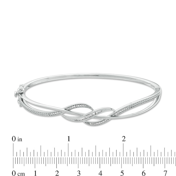 Previously Owned - 1/5 CT. T.w. Diamond Flowy Twist Bangle in Sterling Silver