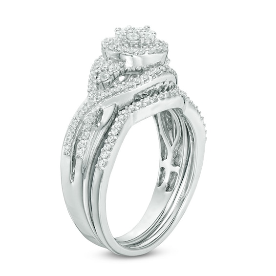 Previously Owned - 1/2 CT. T.w. Composite Diamond Bypass Twist Bridal Set in 10K White Gold