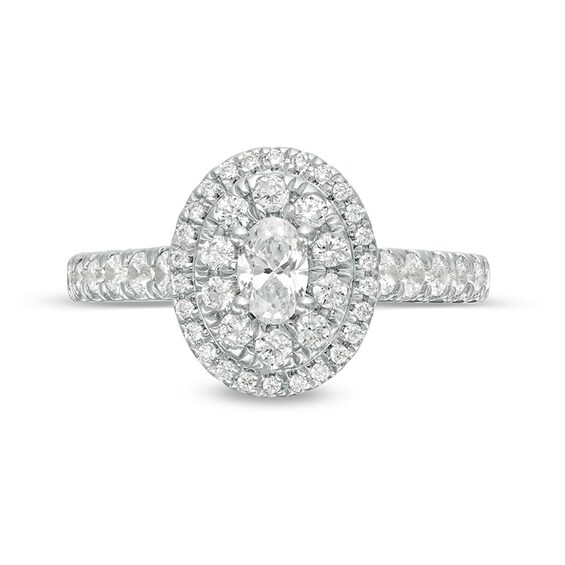 Previously Owned - Love's Destiny by Peoples 1 CT. T.w. Oval Diamond Frame Engagement Ring in 14K White Gold (I/Si2)