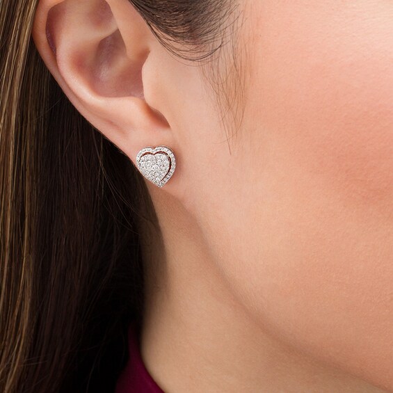 Previously Owned - 1/2 CT. T.w. Multi-Diamond Heart-Shaped Stud Earrings in 10K White Gold