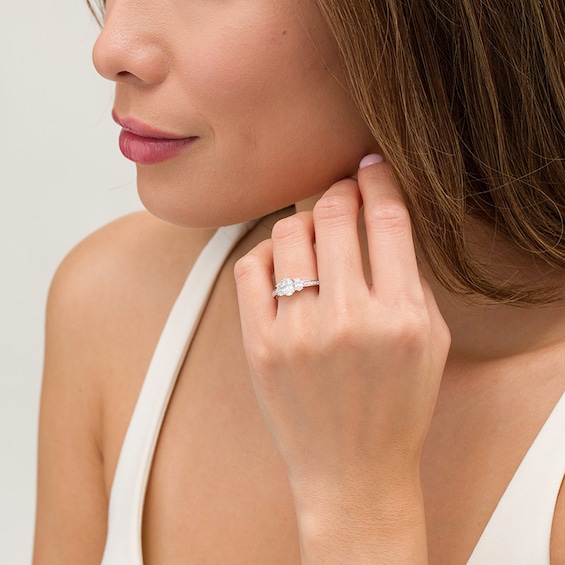 Previously Owned - 1-1/2 CT. T.w. Oval Lab-Grown Diamond Lined Past Present Future® Engagement Ring in 14K White Gold