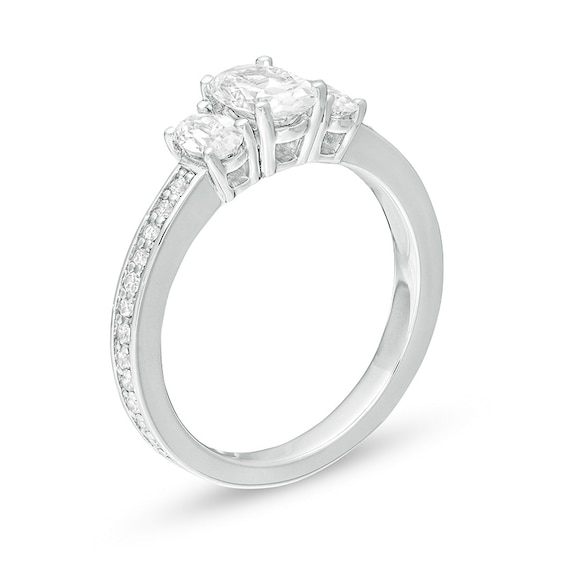 Previously Owned - 1-1/2 CT. T.w. Oval Lab-Grown Diamond Lined Past Present Future® Engagement Ring in 14K White Gold