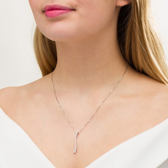 Previously Owned - 1/2 CT. T.w. Journey Diamond Linear Wave Pendant in 10K White Gold