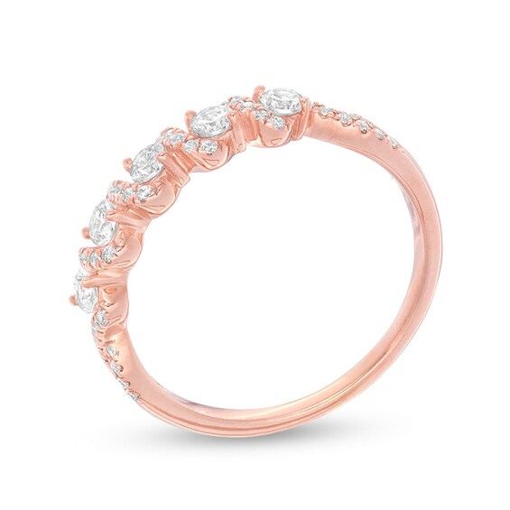 Previously Owned - 1/2 CT. T.w. Diamond Spiral Ring in 14K Rose Gold