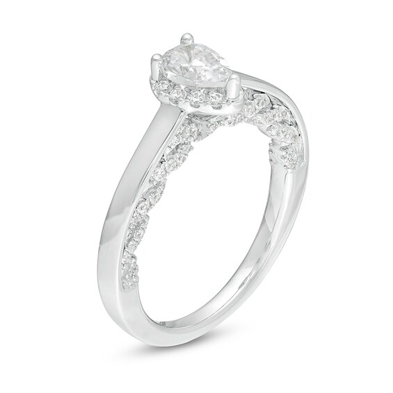 Previously Owned - 1 CT. T.w. Pear-Shaped Diamond Frame Engagement Ring in 14K White Gold (I/I2)