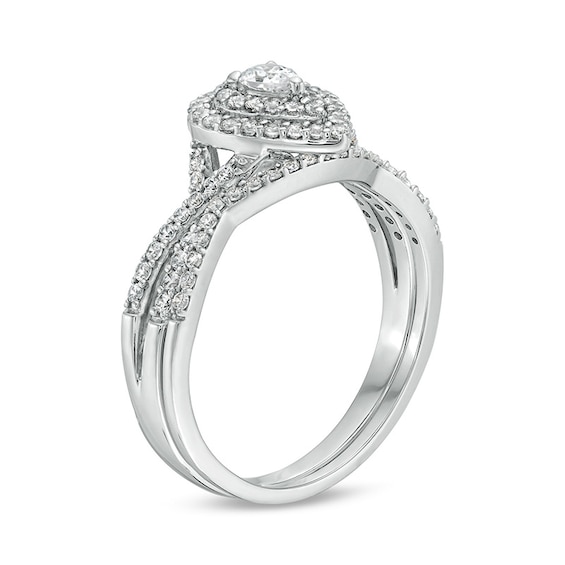Previously Owned - 5/8 CT. T.w. Pear-Shaped Diamond Double Frame Twist Shank Bridal Set in 10K White Gold